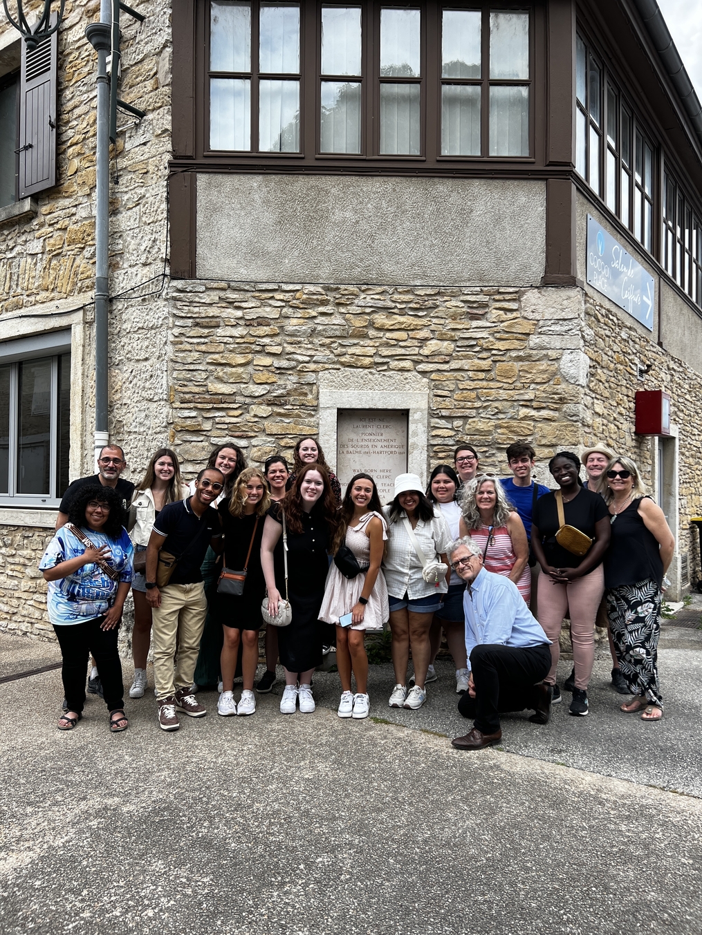 Abby Walent with tour group in front of Laurent Clerc's home